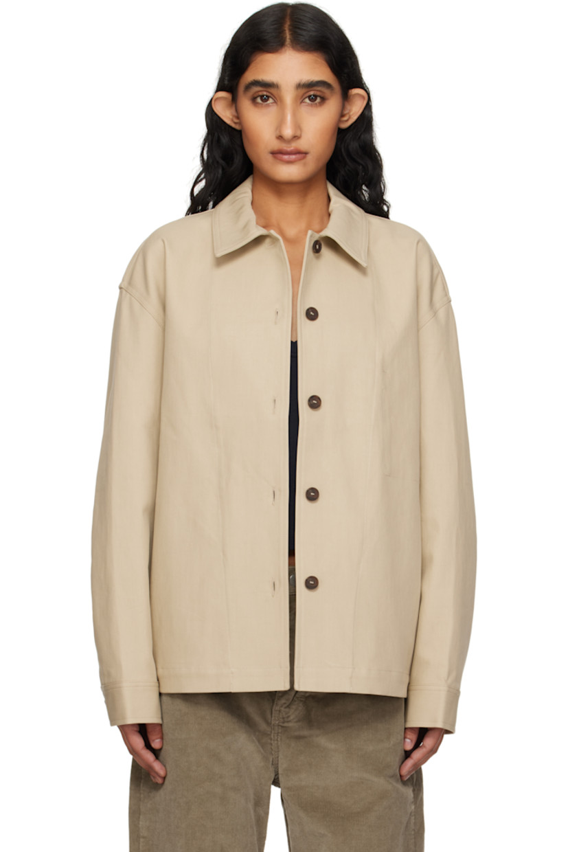 Cotton twill jacket. 

· Spread collar
· Button closure
· Seam pockets at waist
· Dropped shoulders
· Pleat at buttoned barrel cuffs
· Patch pocket at interior 
· Unlined

Supplier color: Sand