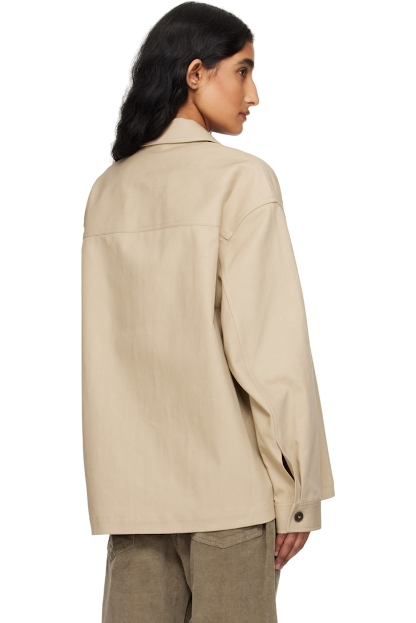 Cotton twill jacket. 

· Spread collar
· Button closure
· Seam pockets at waist
· Dropped shoulders
· Pleat at buttoned barrel cuffs
· Patch pocket at interior 
· Unlined

Supplier color: Sand