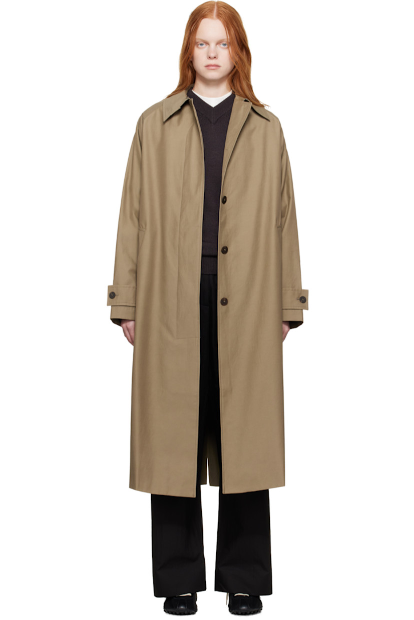 Lightweight cotton-blend gabardine trench coat.

· Water-repellent
· Hook-eye fastening at spread collar
· Concealed button closure
· Welt pockets
· Raglan sleeves
· Adjustable button tab at cuffs
· Central vent at back hem
· Patch pocket at interior
· Full twill lining

Supplier color: Dark dusk