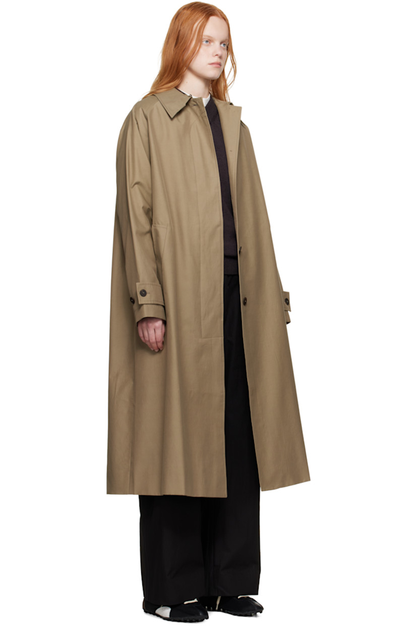Lightweight cotton-blend gabardine trench coat.

· Water-repellent
· Hook-eye fastening at spread collar
· Concealed button closure
· Welt pockets
· Raglan sleeves
· Adjustable button tab at cuffs
· Central vent at back hem
· Patch pocket at interior
· Full twill lining

Supplier color: Dark dusk