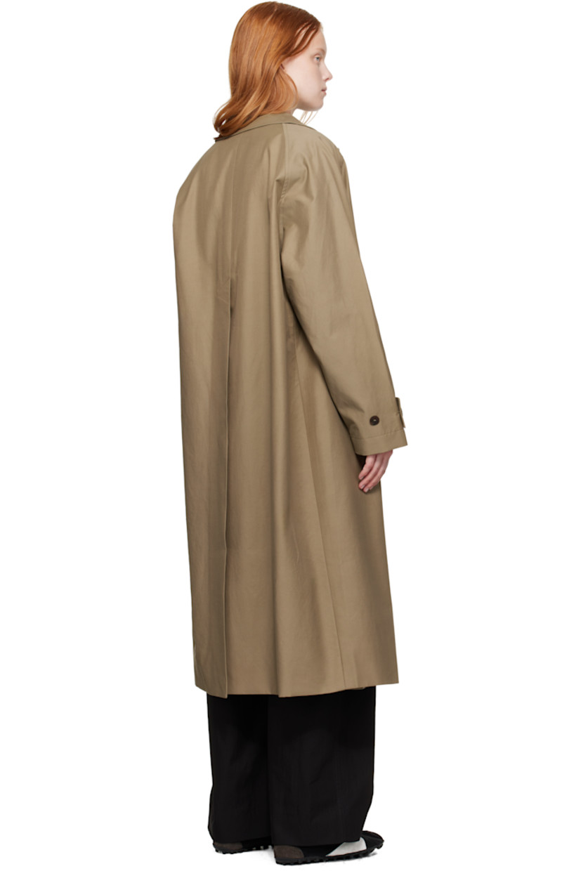 Lightweight cotton-blend gabardine trench coat.

· Water-repellent
· Hook-eye fastening at spread collar
· Concealed button closure
· Welt pockets
· Raglan sleeves
· Adjustable button tab at cuffs
· Central vent at back hem
· Patch pocket at interior
· Full twill lining

Supplier color: Dark dusk
