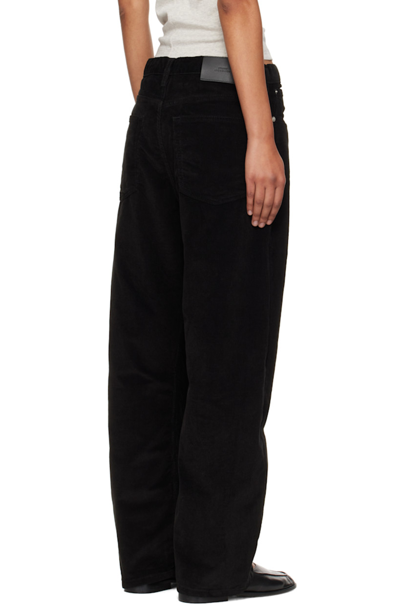 Stretch cotton corduroy jeans. 

· Wide-leg 
· Belt loops
· Five-pocket styling
· Zip fly 
· Offset outseams
· Leather logo patch at back waistband

Supplier color: Black