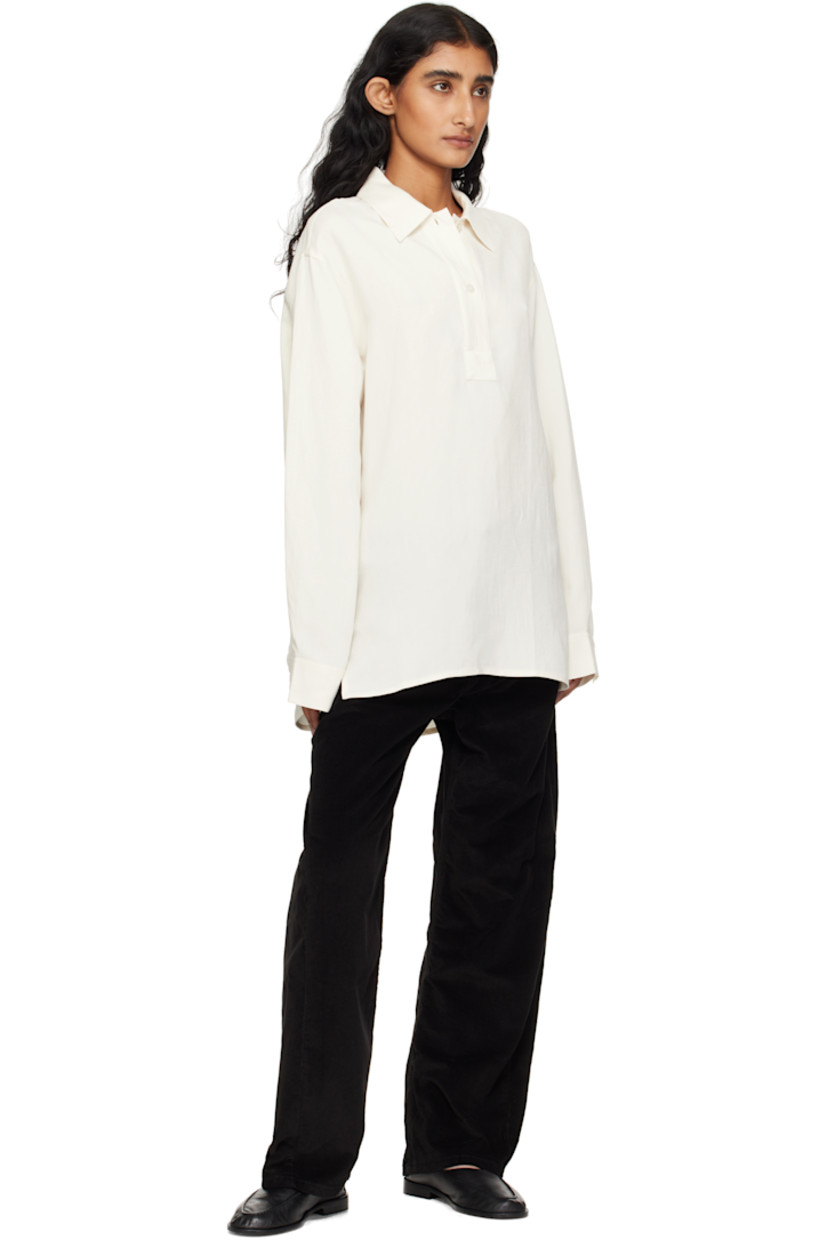 Stretch cotton corduroy jeans. 

· Wide-leg 
· Belt loops
· Five-pocket styling
· Zip fly 
· Offset outseams
· Leather logo patch at back waistband

Supplier color: Black