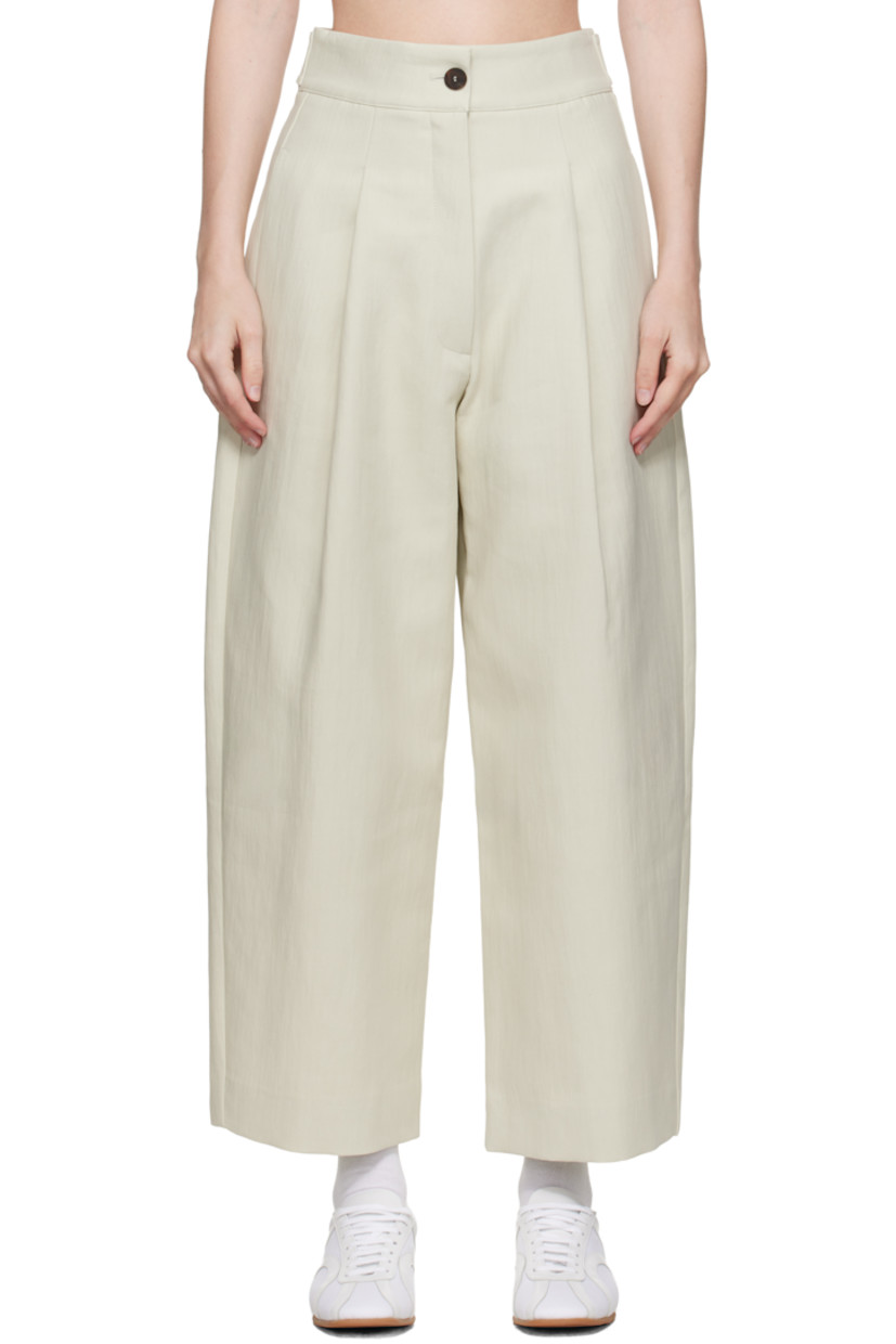 Crinkled cotton-blend twill trousers.

· Four-pocket styling
· Zip fly
· Pleats at front
· Creased legs
· Adjustable button tabs at back waistband

Supplier color: Dove