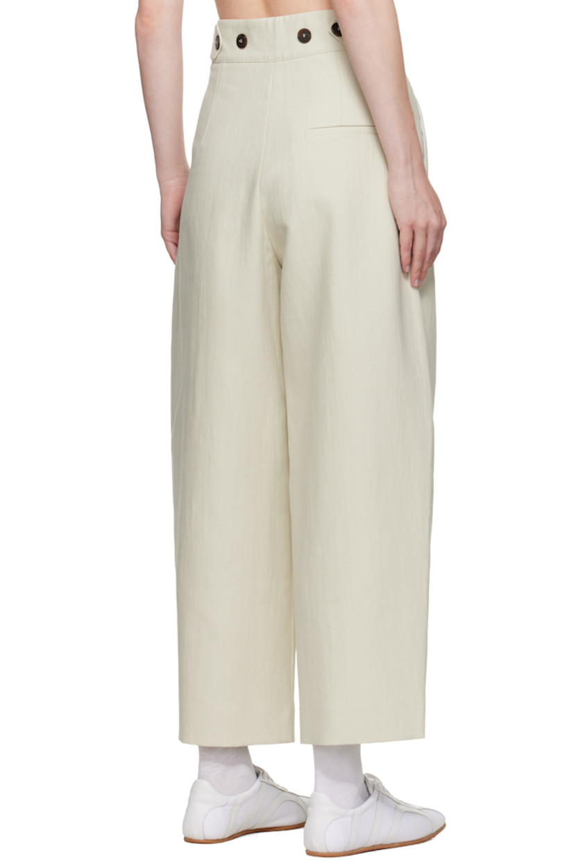 Crinkled cotton-blend twill trousers.

· Four-pocket styling
· Zip fly
· Pleats at front
· Creased legs
· Adjustable button tabs at back waistband

Supplier color: Dove