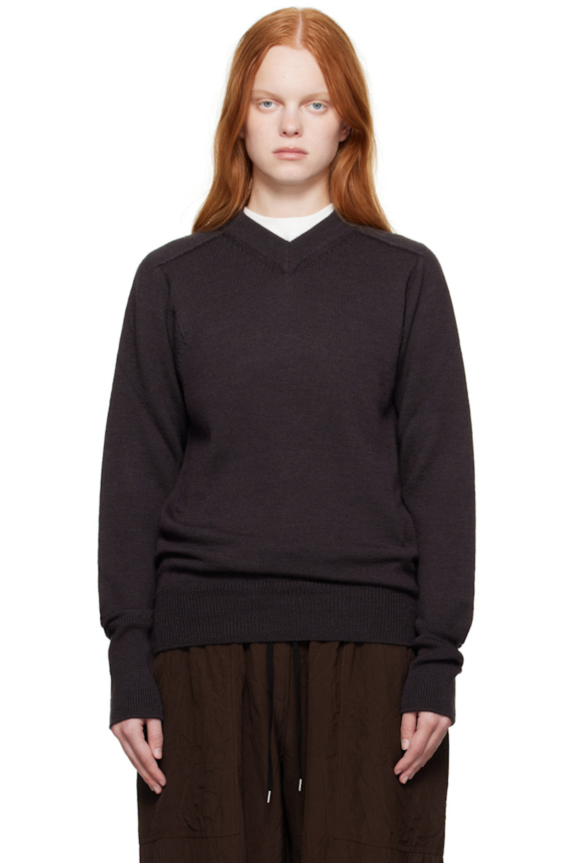 Knit extrafine merino wool sweater.

· Rib-knit V-neck, hem, and cuffs
· Saddle shoulders

Supplier color: Walnut