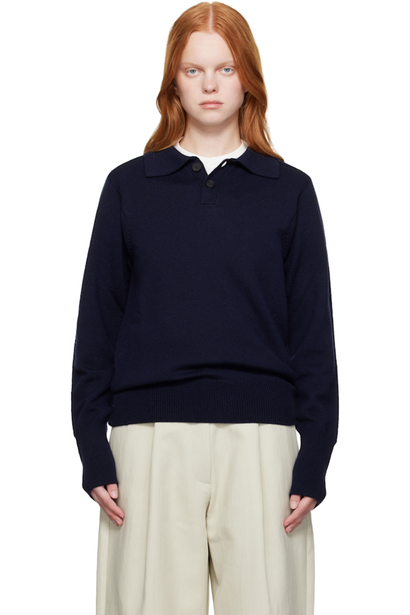 Knit extrafine merino wool polo.

· Rib-knit spread collar, hem, and cuffs
· Two-button placket
· Saddle shoulders

Supplier color: Navy
