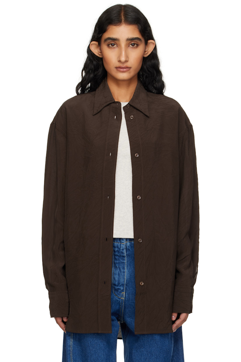 Crinkled plain-woven viscose shirt.

· Spread collar
· Button closure
· Shirttail hem 
· Button barrel cuffs
· Box pleat at back yoke 

Supplier color: Almond