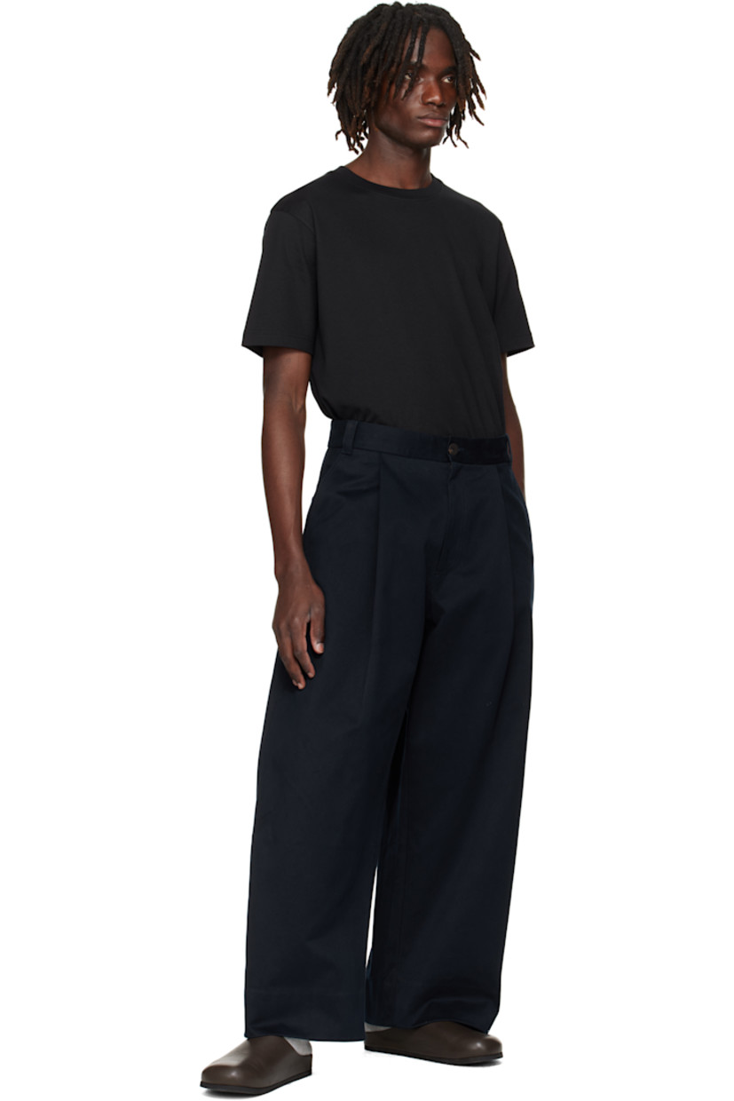 Peached cotton twill trousers.

· Wide-leg
· High-rise
· Belt loops
· Four-pocket styling
· Zip fly
· Pleats at front

Supplier color: Dark Navy