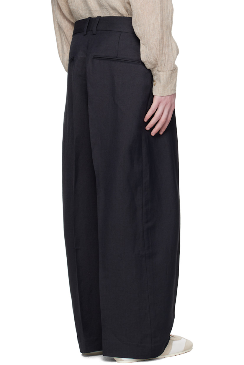 Linen- and viscose-blend hopsack trousers.

· Loose-fit
· Belt loops
· Four-pocket styling
· Zip fly
· Creased legs

Supplier color: Darkest navy