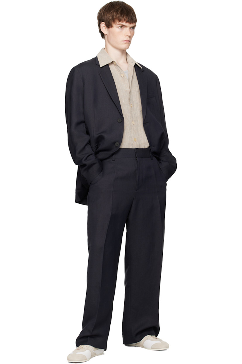 Linen- and viscose-blend hopsack trousers.

· Loose-fit
· Belt loops
· Four-pocket styling
· Zip fly
· Creased legs

Supplier color: Darkest navy