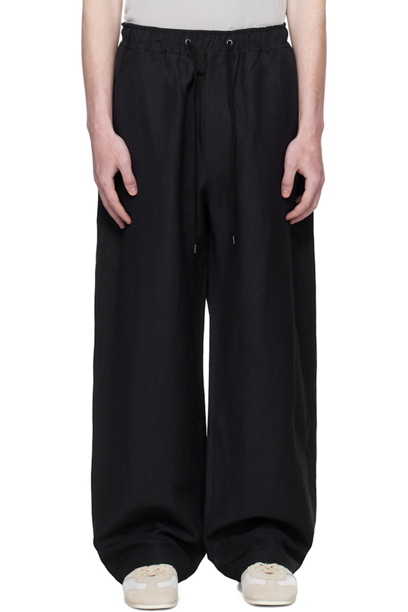 Linen- and wool-blend hopsack trousers.

· Loose-fit
· Drawstring at elasticized waistband 
· Four-pocket styling
· Mock fly

Supplier color: Darkest navy