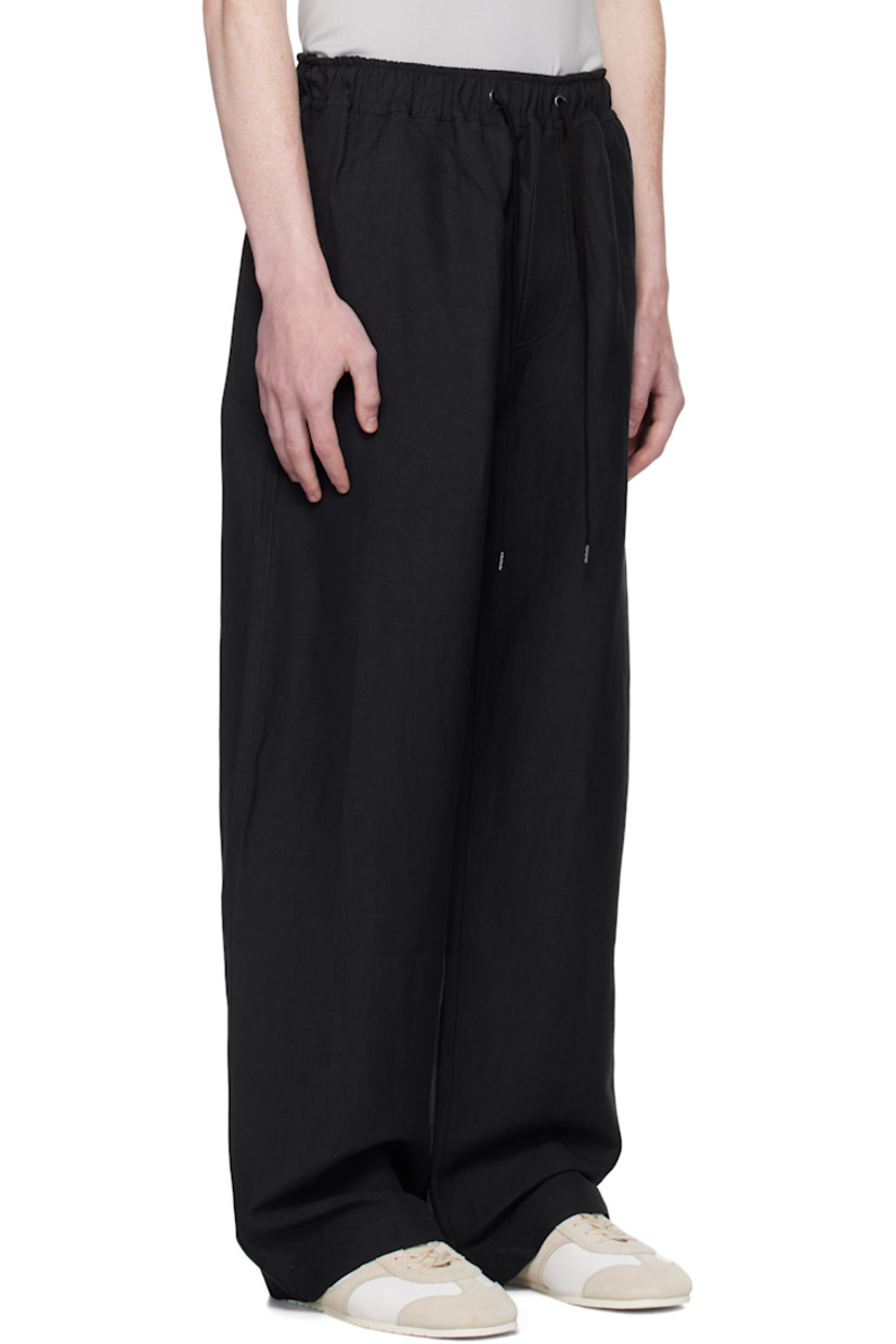 Linen- and wool-blend hopsack trousers.

· Loose-fit
· Drawstring at elasticized waistband 
· Four-pocket styling
· Mock fly

Supplier color: Darkest navy