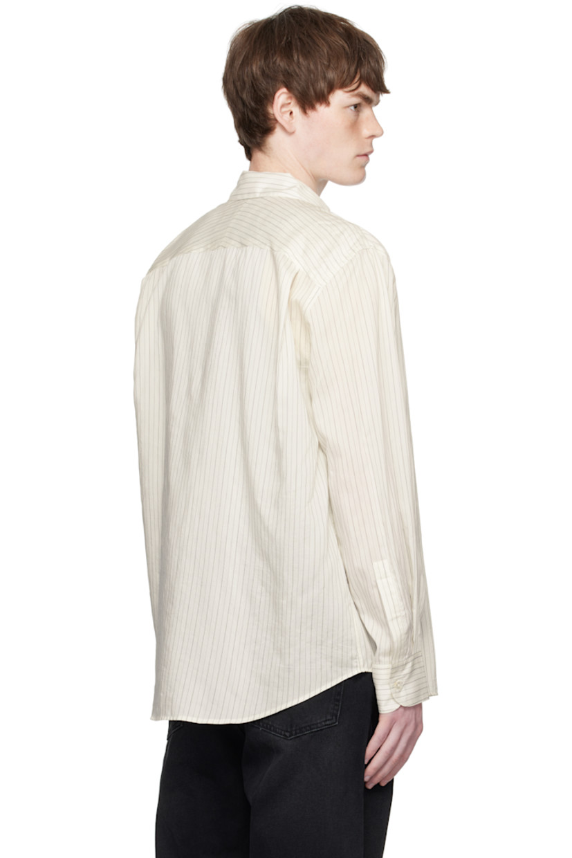 Silk-blend poplin shirt.

· Stripes throughout
· Spread collar
· Button closure
· Shirttail hem
· Buttoned barrel cuffs
· Twin pleats at back yoke

Supplier color: Ecru/Black stripe