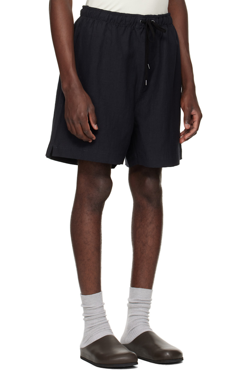 Linen- and wool-blend twill shorts.

· Drawstring at elasticized waistband
· Three-pocket styling
· Vented cuffs

Supplier color: Darkest Navy