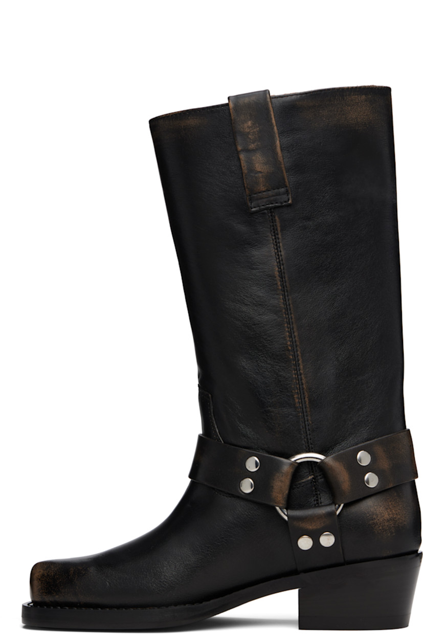 Mid-calf brushed leather boots in black.

· Square toe
· Harness-style straps at sides
· Pull-loops at collar
· Buffed leather lining
· Stacked leather block heel with rubber injection
· Leather sole
· Heel: H2"

Supplier color: Black
