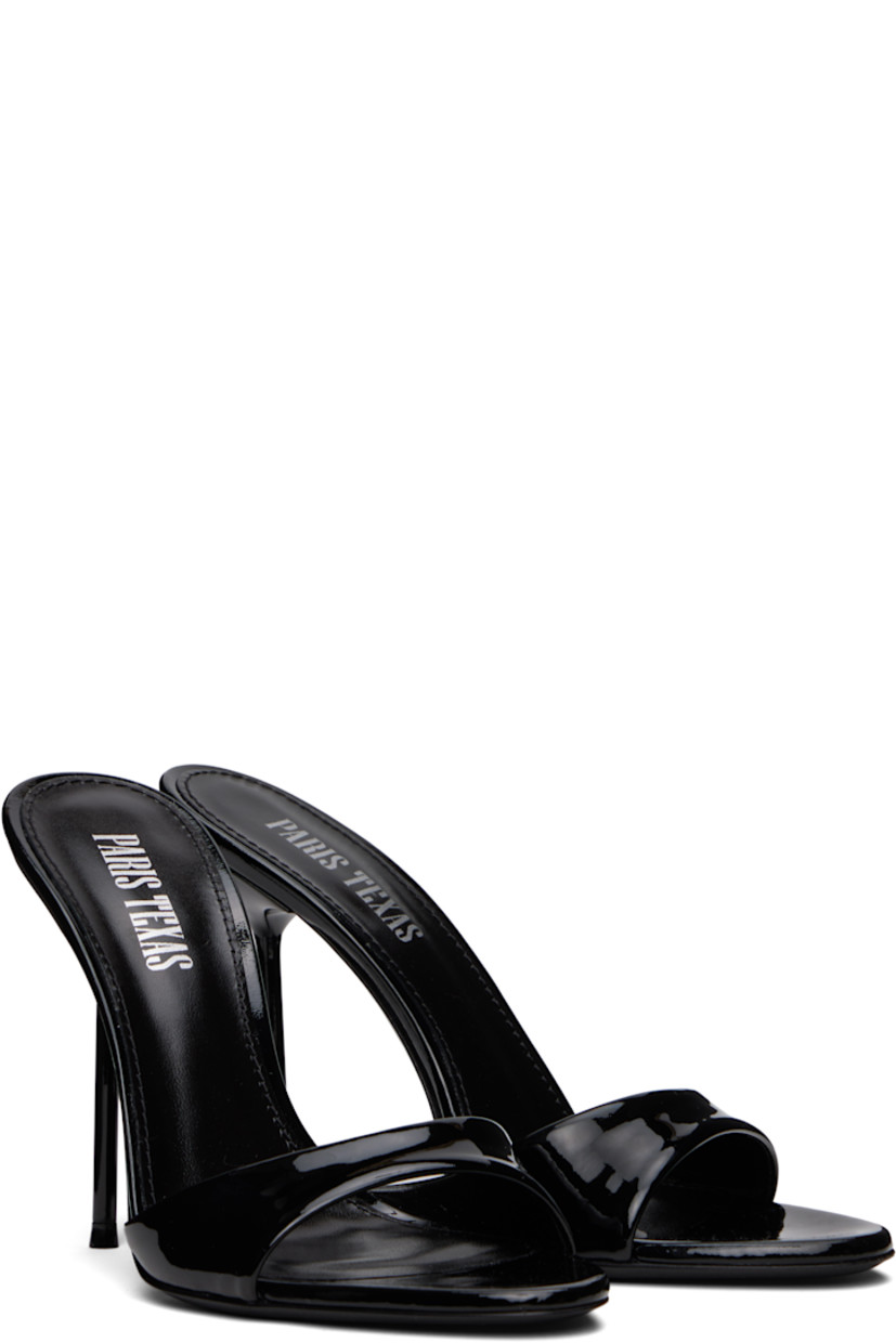 Patent leather mules in black.

· Open toe
· Logo stamp at padded leather footbed
· Lacquered stiletto heel with rubber injection
· Polished leather sole
· Heel: H4"

Supplier color: Black