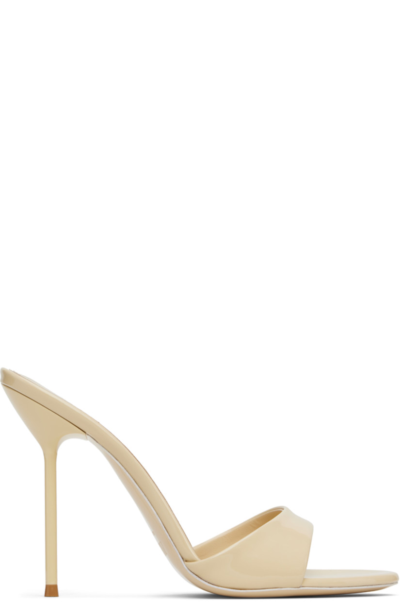 Patent leather mules.

· Open toe
· Strap at vamp
· Logo stamp at padded leather footbed
· Metal stiletto heel with rubber injection
· Patent leather sole
· Heel: H4"

Supplier color: Almond