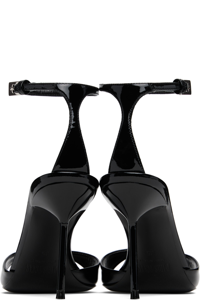 Patent leather heeled sandals.

· Open toe
· Pin-buckle ankle strap
· Logo stamp at padded footbed
· Covered stiletto heel with rubber injection
· Leather sole
· Heel: H3.5"

Supplier color: Black
