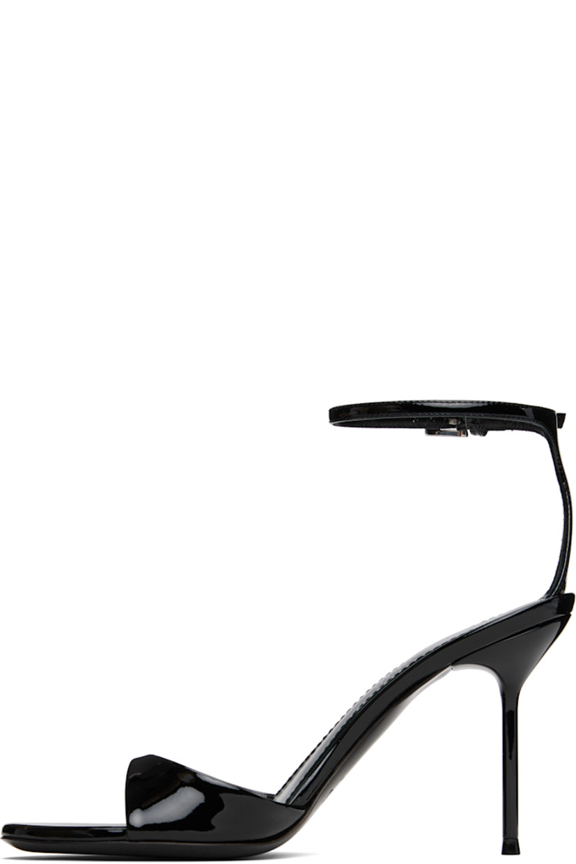 Patent leather heeled sandals.

· Open toe
· Pin-buckle ankle strap
· Logo stamp at padded footbed
· Covered stiletto heel with rubber injection
· Leather sole
· Heel: H3.5"

Supplier color: Black