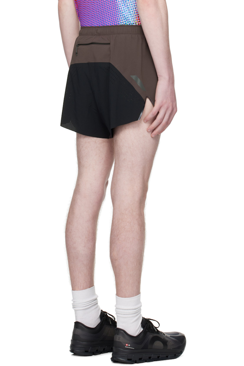 4-way stretch jersey shorts. 

· Lightweight and quick-drying
· Bonded seams throughout
· Concealed drawstring at elasticized waistband
· Vented outseams
· Laser-cut perforations and reflective trim at back
· Bonded logo patch at back
· Zip pocket at back waistband
· Briefs-style stretch jersey lining

Supplier color: Grey/Black