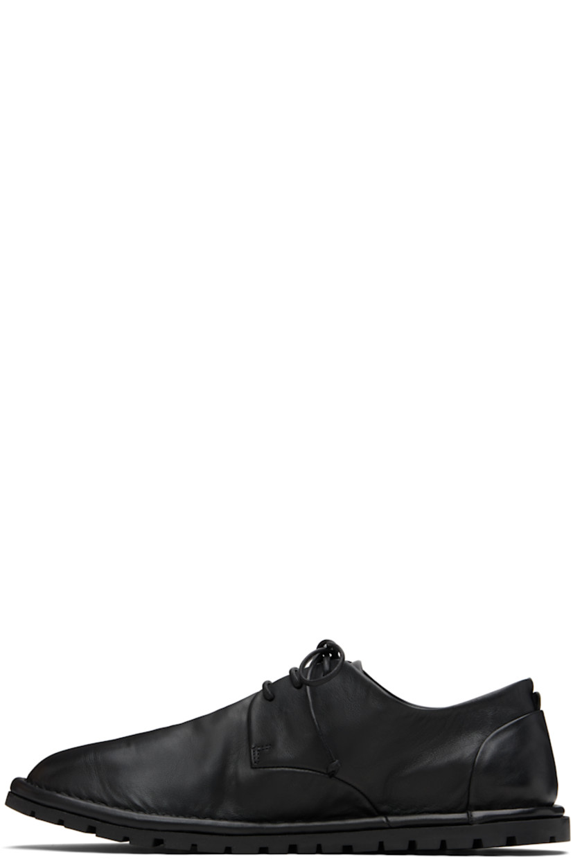 Buffed leather derbys.

· Lace-up closure
· Pull-loop at heel counter
· Topstitching at welt
· Treaded rubber sole

Supplier color: Black