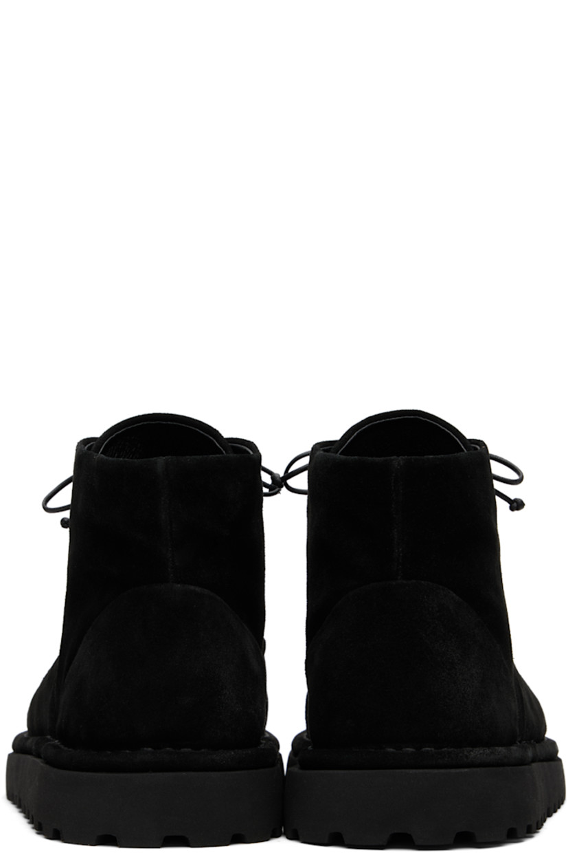 Ankle-high suede boots.

· Lace-up closure
· Suede and leather lining
· San Crispino welt
· Treaded foam rubber sole

Part of the Gomme® collection.

Supplier color: Black