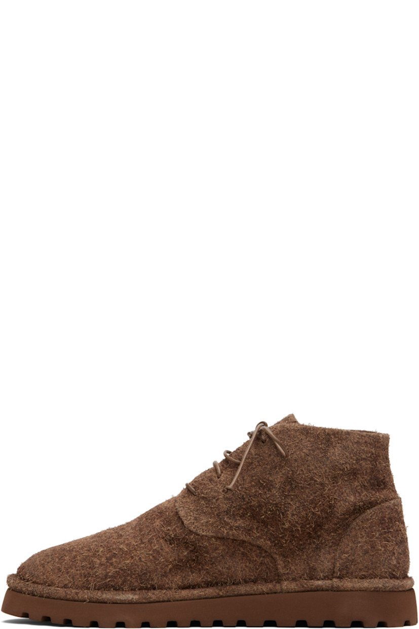 Ankle-high brushed suede boots.

· Lace-up closure
· Suede and leather lining
· Treaded rubber sole

Supplier color: Dark brown