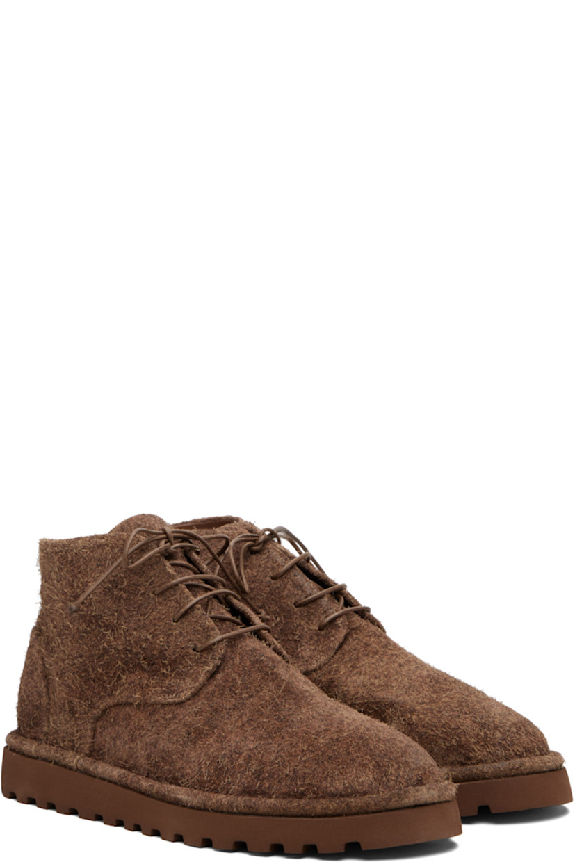 Ankle-high brushed suede boots.

· Lace-up closure
· Suede and leather lining
· Treaded rubber sole

Supplier color: Dark brown
