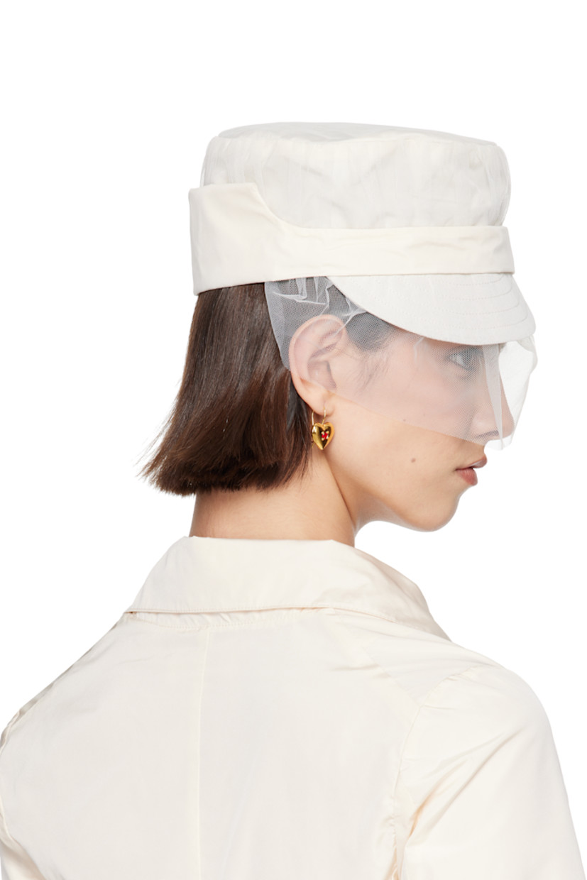 Polyester satin and taffeta hat in white.

· Ruched tulle overlay throughout
· Quilted brim
· Gathered veil at face
· Foldover panel at sides for alternate styling
· Full oxford cloth lining

Part of the exclusive SSENSE Bridal capsule.

Supplier color: White