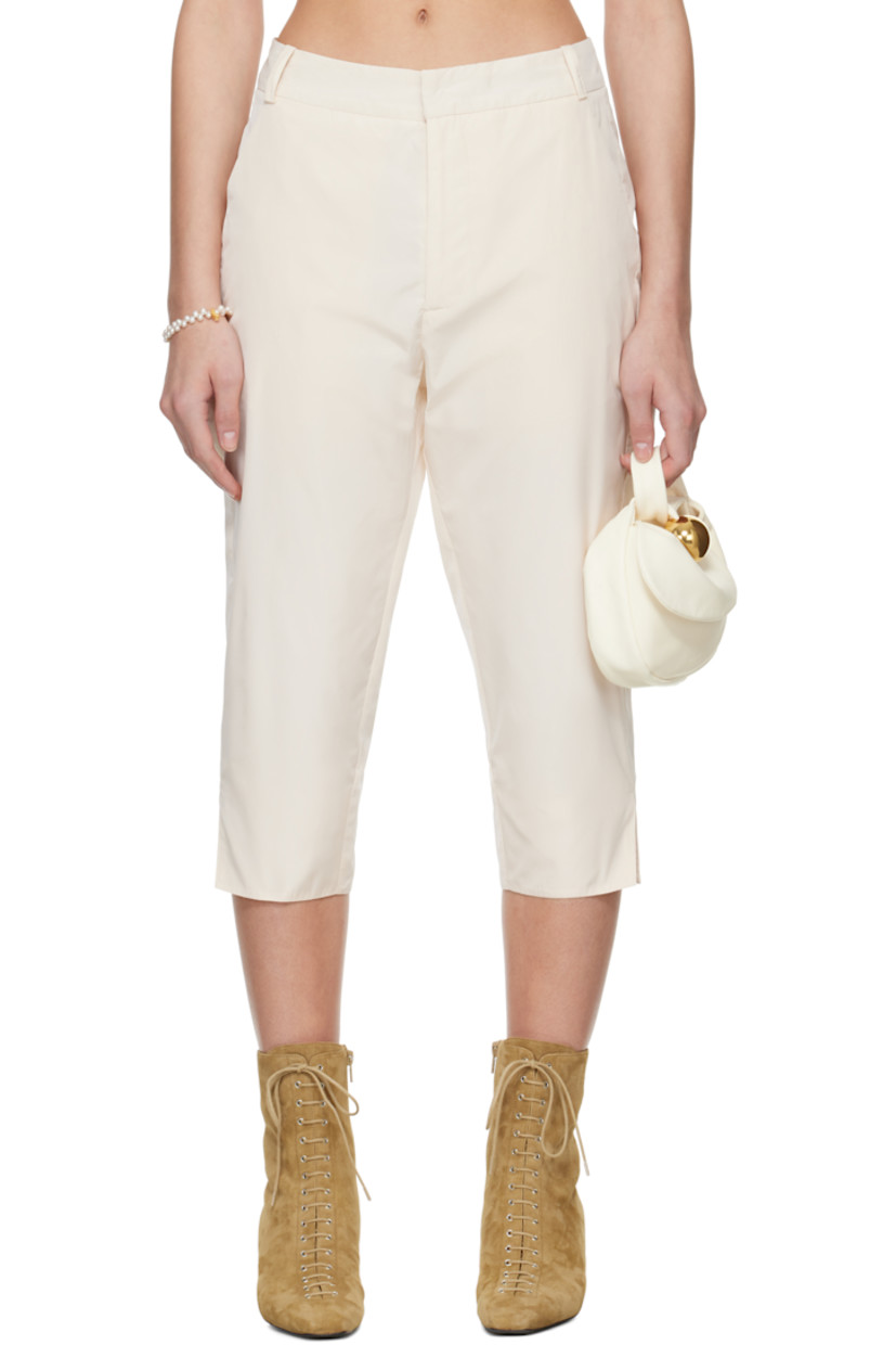 Polyester taffeta leggings.

· High-rise
· Belt loops
· Two-pocket styling
· Zip fly
· Vented cuffs
· Full satin lining

Part of the exclusive SSENSE Bridal capsule.

Supplier color: White