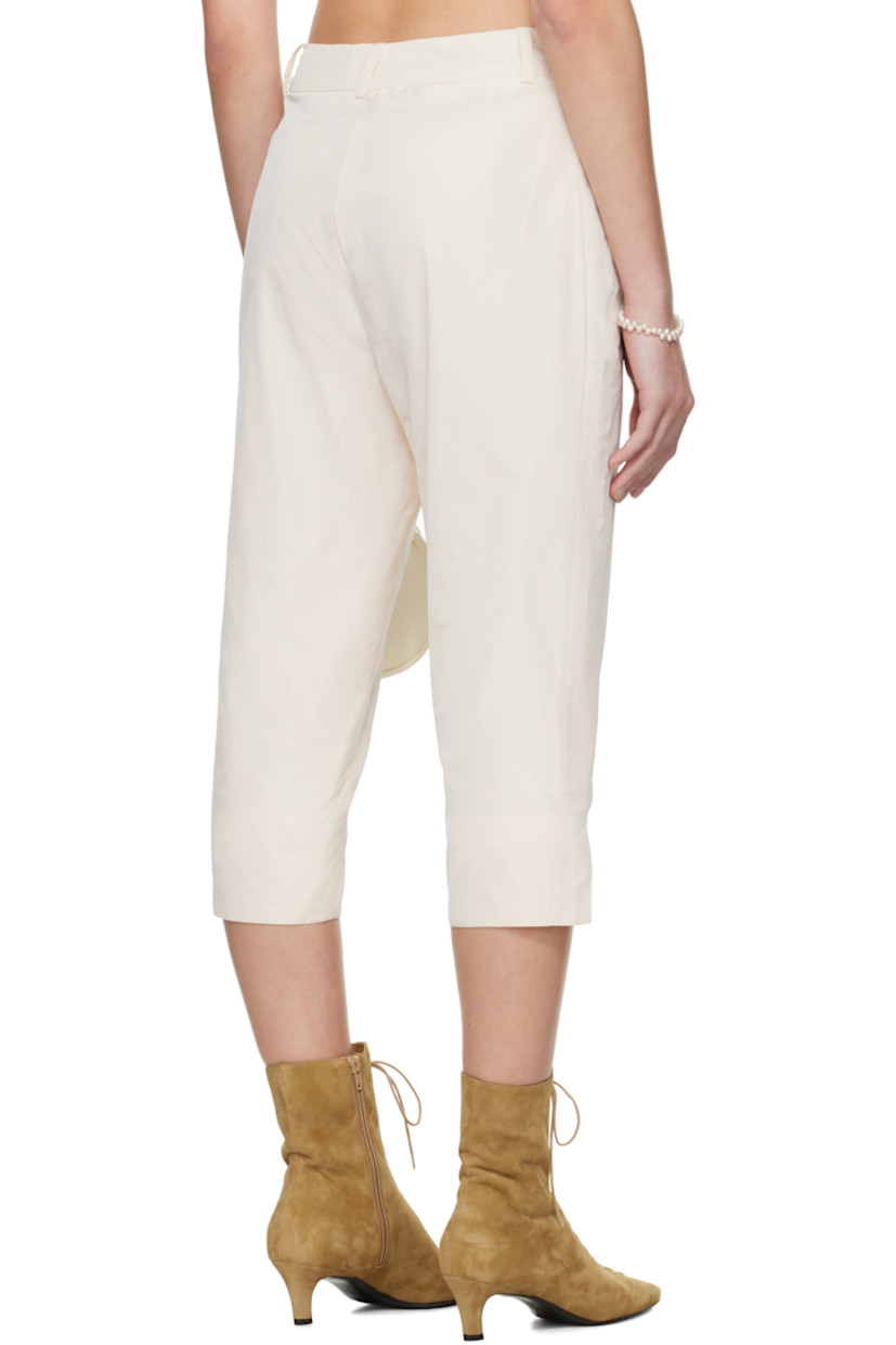Polyester taffeta leggings.

· High-rise
· Belt loops
· Two-pocket styling
· Zip fly
· Vented cuffs
· Full satin lining

Part of the exclusive SSENSE Bridal capsule.

Supplier color: White