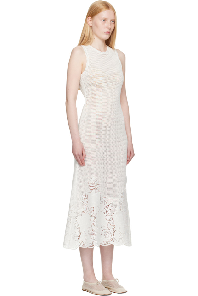 Semi-sheer open-knit mercerized cotton midi dress. Scalloped edges throughout.

· Crewneck
· Broderie anglaise detailing at hem 
· Keyhole with button fastening at back collar

Supplier color: Ivory