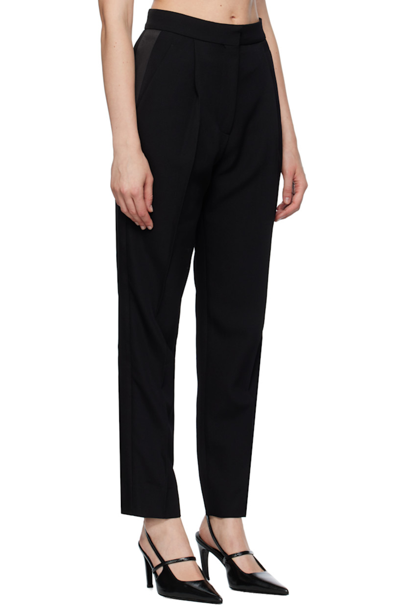 Wool grain de poudre trousers.

· Four-pocket styling
· Zip-fly
· Pleats at front
· Creased legs
· Silk-blend satin trim at outseams

Supplier color: Black