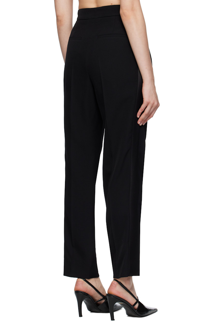 Wool grain de poudre trousers.

· Four-pocket styling
· Zip-fly
· Pleats at front
· Creased legs
· Silk-blend satin trim at outseams

Supplier color: Black