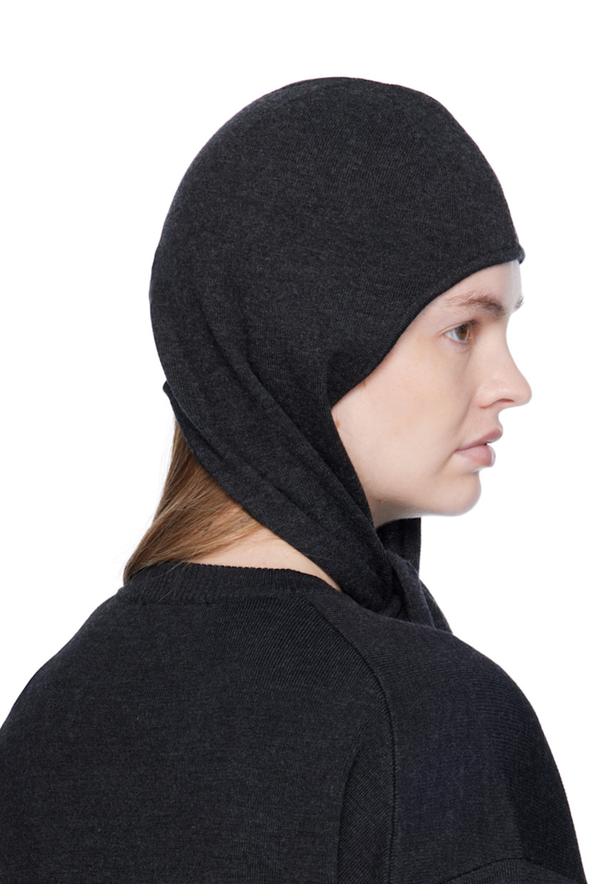 Knit wool hood. Extended self-tie straps.

Supplier color: Anthracite melange