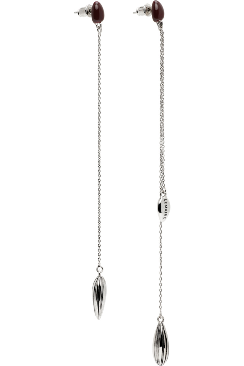 Pair of mismatched drop earrings in silver-tone brass.

· Resin accent in burgundy at face
· Graphic with black enamel stripes at drop
· Post-stud fastening
· H5.5" x W0.5"; H4.5" x W0.5"

Supplier color: Silver