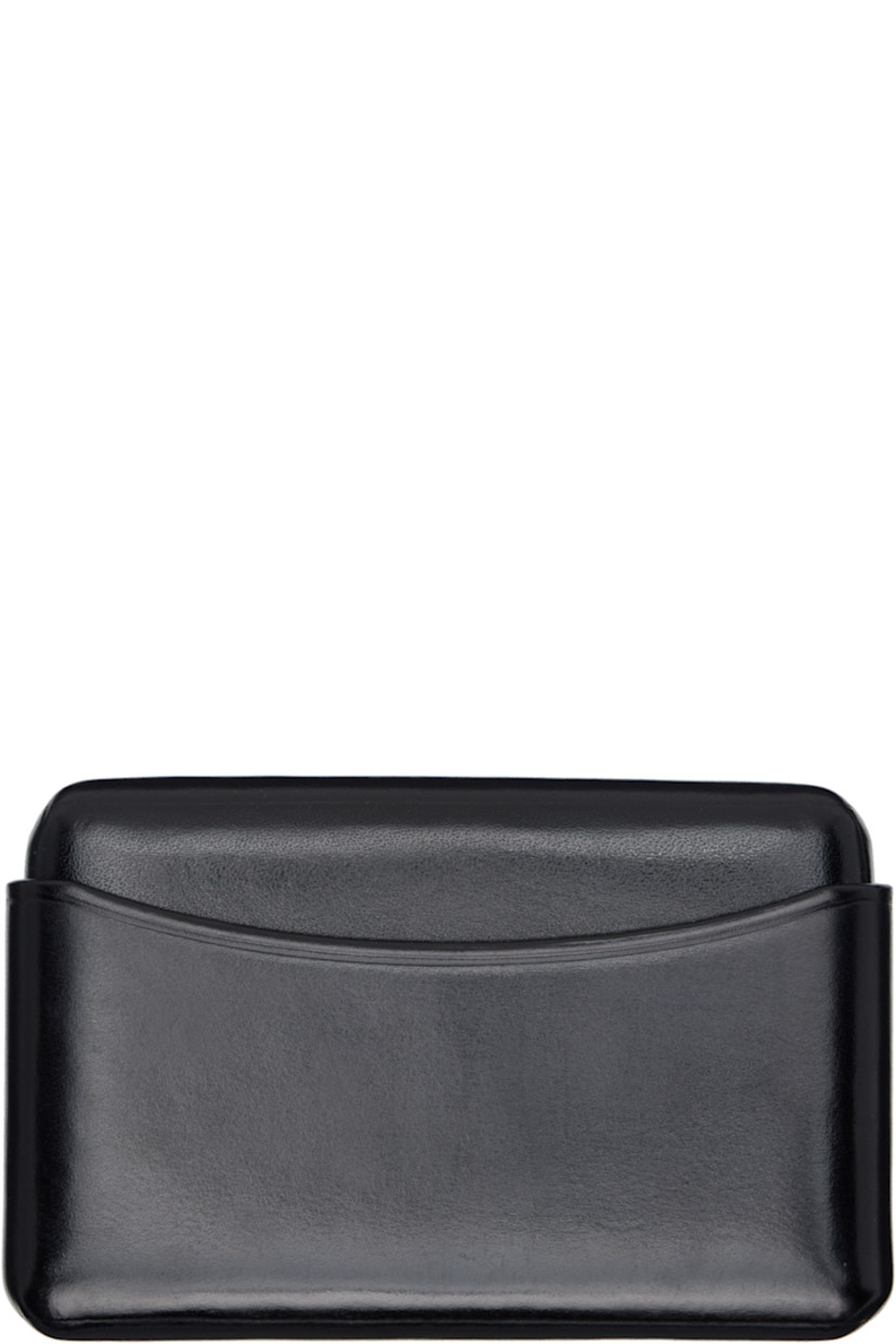 Sheathed two-piece buffed leather card holder.

· LWG-certified leather
· H2.5" x W4" x D0.75"

Supplier color: Black