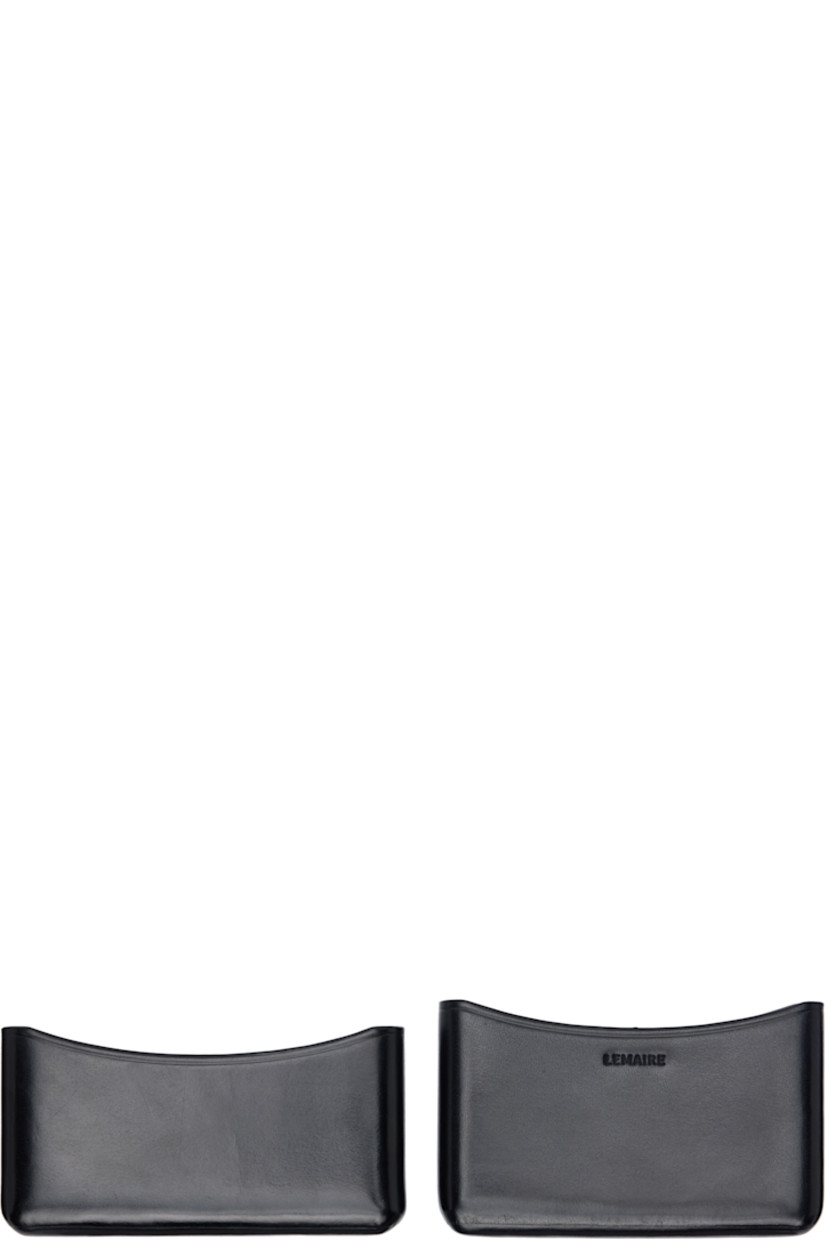 Sheathed two-piece buffed leather card holder.

· LWG-certified leather
· H2.5" x W4" x D0.75"

Supplier color: Black
