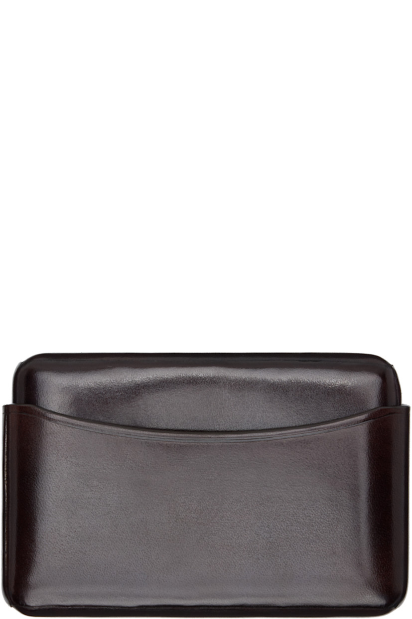 Sheathed buffed leather card holder.

· LWG-certified leather
· H2.5" x W4" x D0.75"

Supplier color: Ristretto