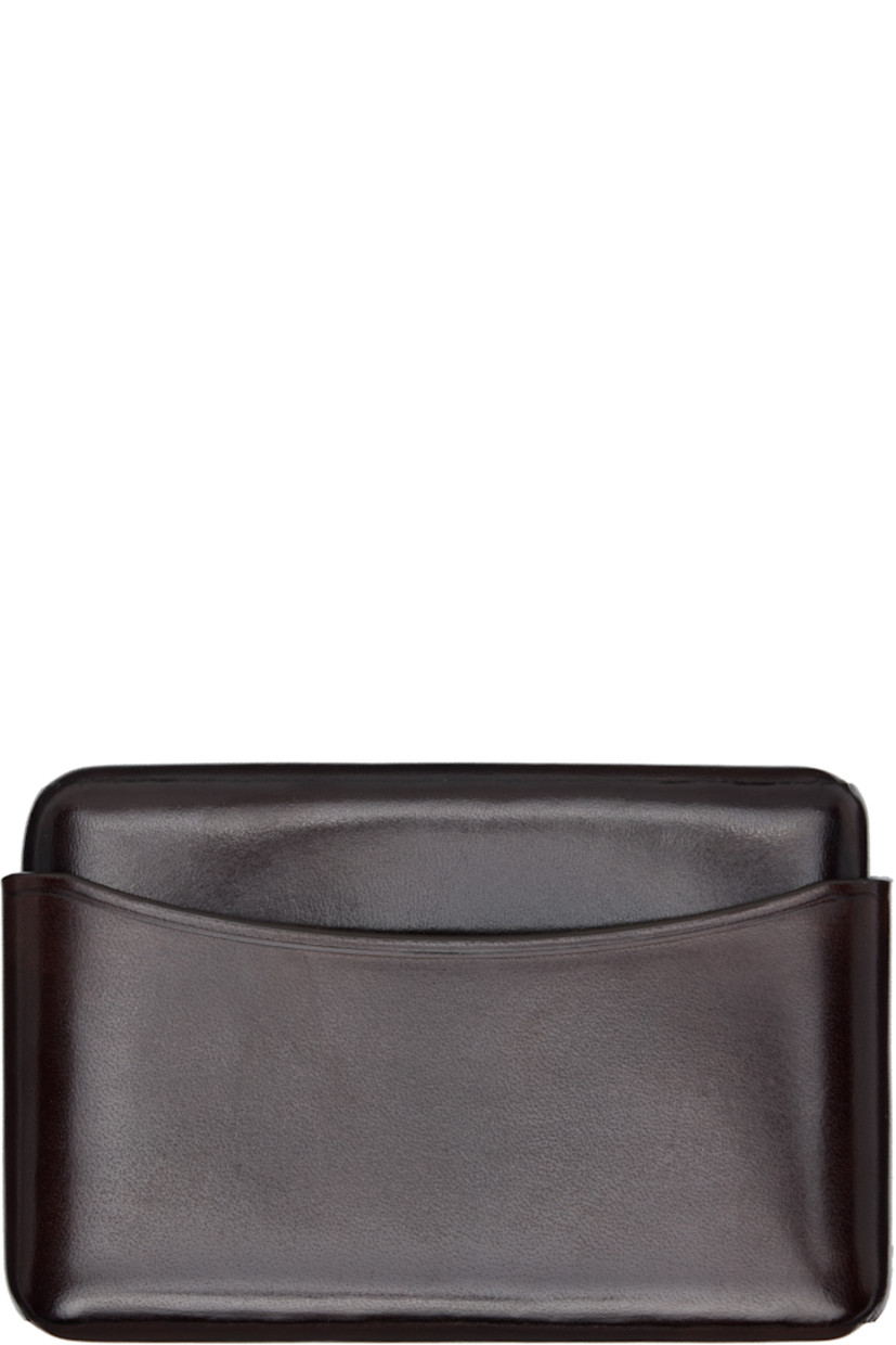 Sheathed buffed leather card holder.

· LWG-certified leather
· H2.5" x W4" x D0.75"

Supplier color: Ristretto
