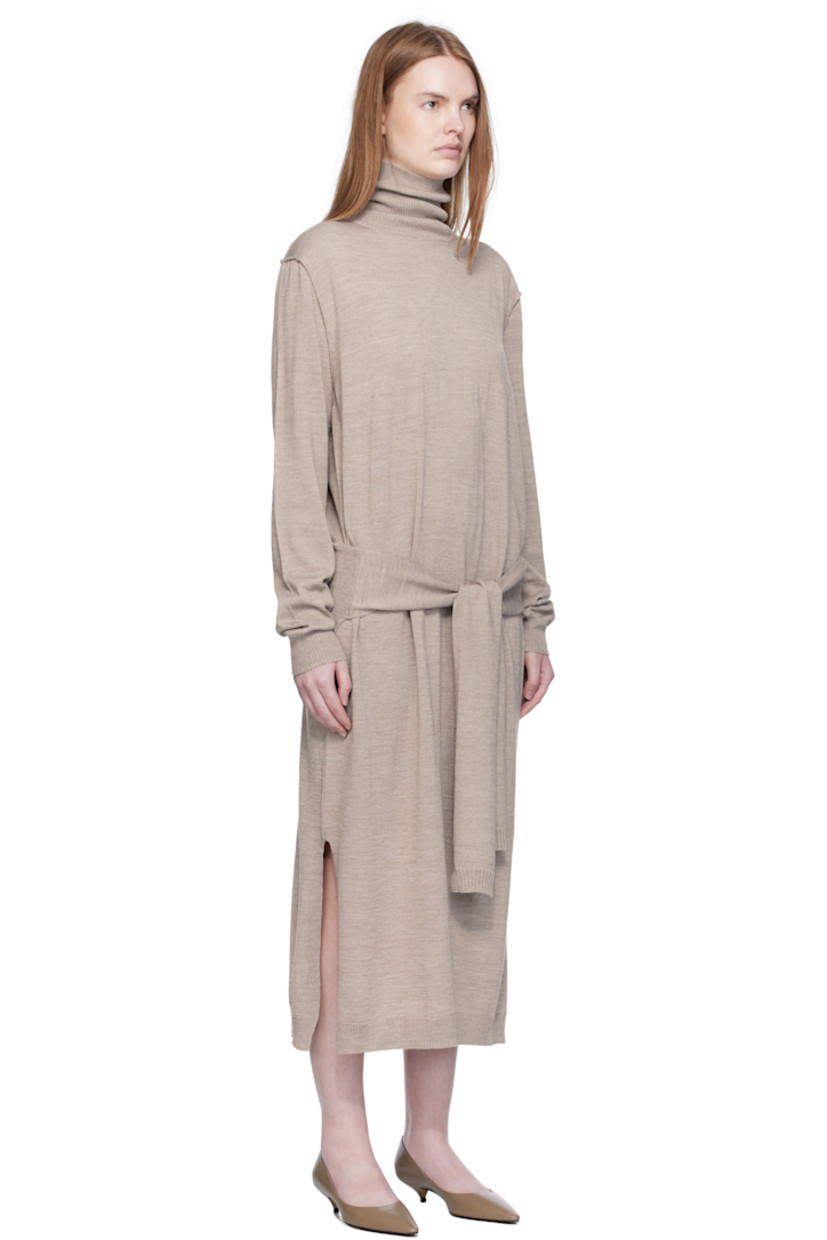 Knit wool-blend midi dress.

· Exposed seams throughout
· Rib-knit turtleneck, hem, and cuffs
· Self-tie sweater-style panel at waist
· Vented side seams

Supplier color: Light taupe