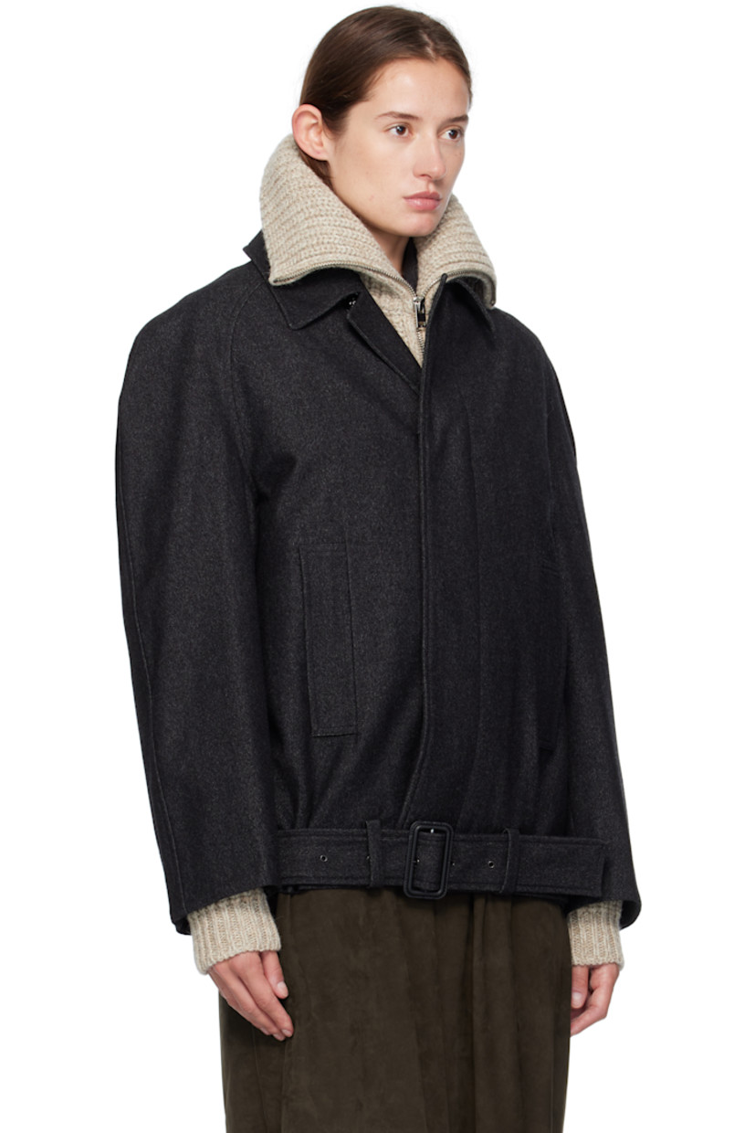 Virgin wool- and cotton-blend twill coat.

· RWS-certified wool
· Spread collar
· Concealed button closure
· Welt pockets at waist
· Cropped hem
· Belt loops and detachable pin-buckle belt at hem
· Raglan sleeves
· Full cotton twill lining

Supplier color: Black/Grey melange