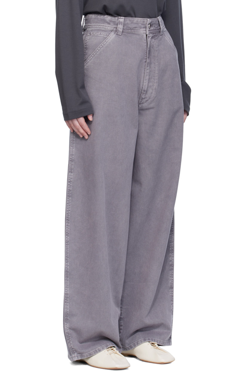 Garment-dyed non-stretch denim jeans.

· Wide-leg
· Belt loops
· Five-pocket styling
· Zip fly
· Leather logo patch at back waistband

Supplier color: Heather