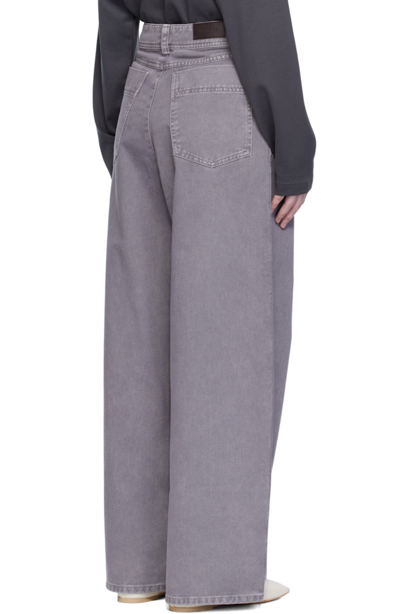 Garment-dyed non-stretch denim jeans.

· Wide-leg
· Belt loops
· Five-pocket styling
· Zip fly
· Leather logo patch at back waistband

Supplier color: Heather
