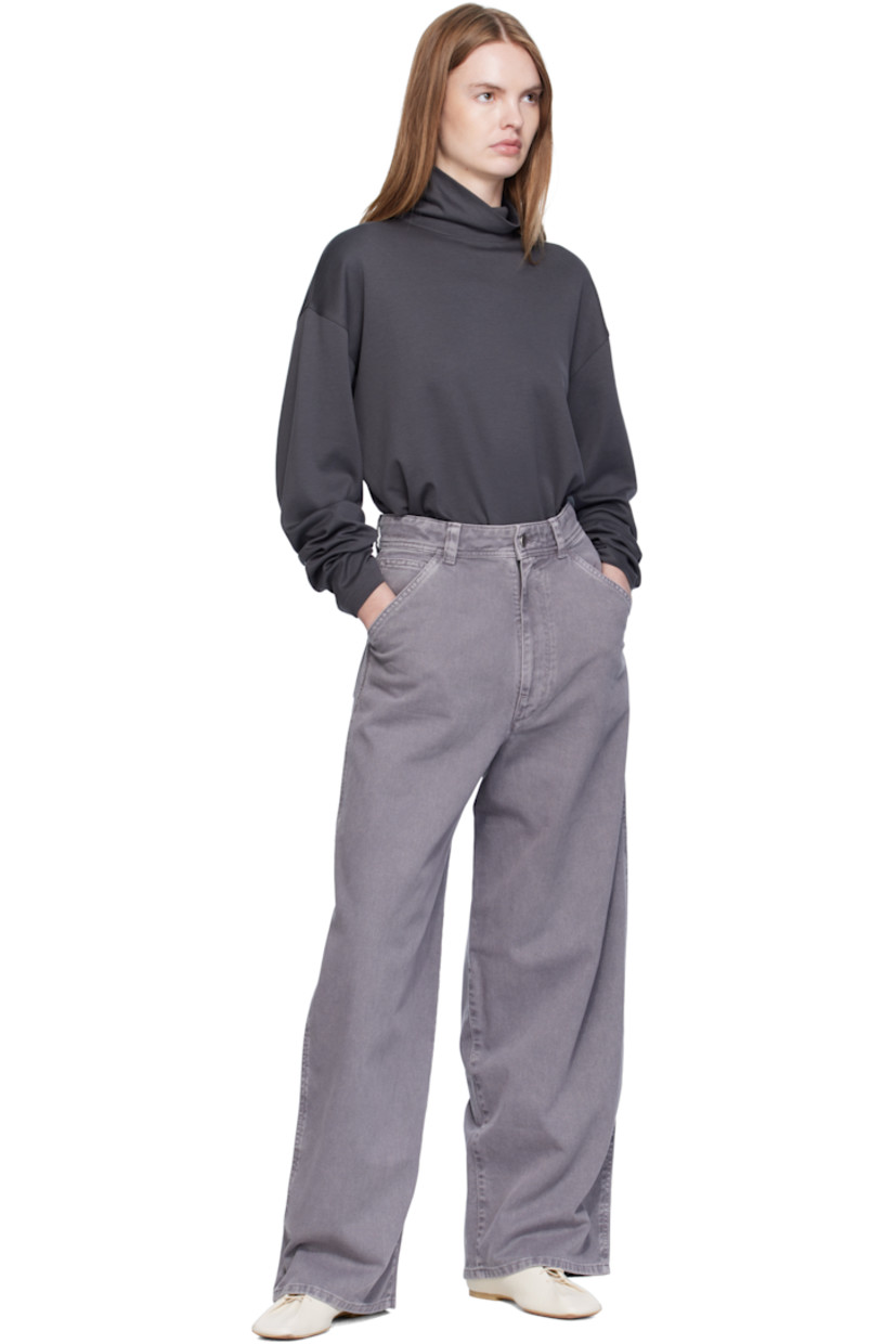 Garment-dyed non-stretch denim jeans.

· Wide-leg
· Belt loops
· Five-pocket styling
· Zip fly
· Leather logo patch at back waistband

Supplier color: Heather