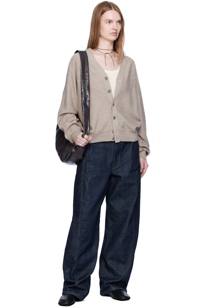 Heavyweight non-stretch denim jeans.

· Fading throughout
· Mid-rise
· Belt loops
· Detachable cinch belt
· Four-pocket styling
· Zip fly
· Twisted outseams
· Leather logo patch at back waistband
· Contrast stitching in brown

Supplier color: Denim indigo