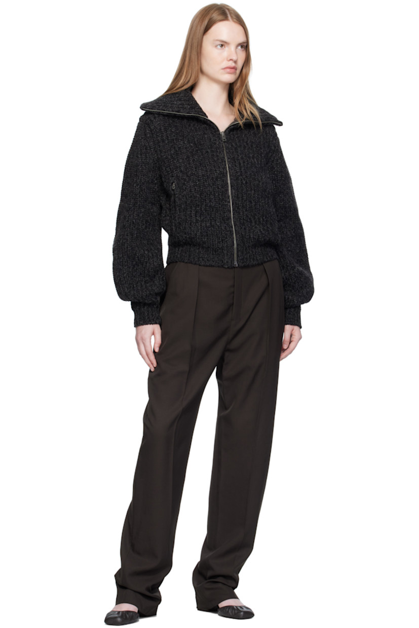 Rib-knit alpaca- and yak-blend cardigan.

· Marling throughout
· Funnel neck
· Zip closure
· Zip pockets at front
· Cropped hem
· Dropped shoulders

Supplier color: Black/Mink brown