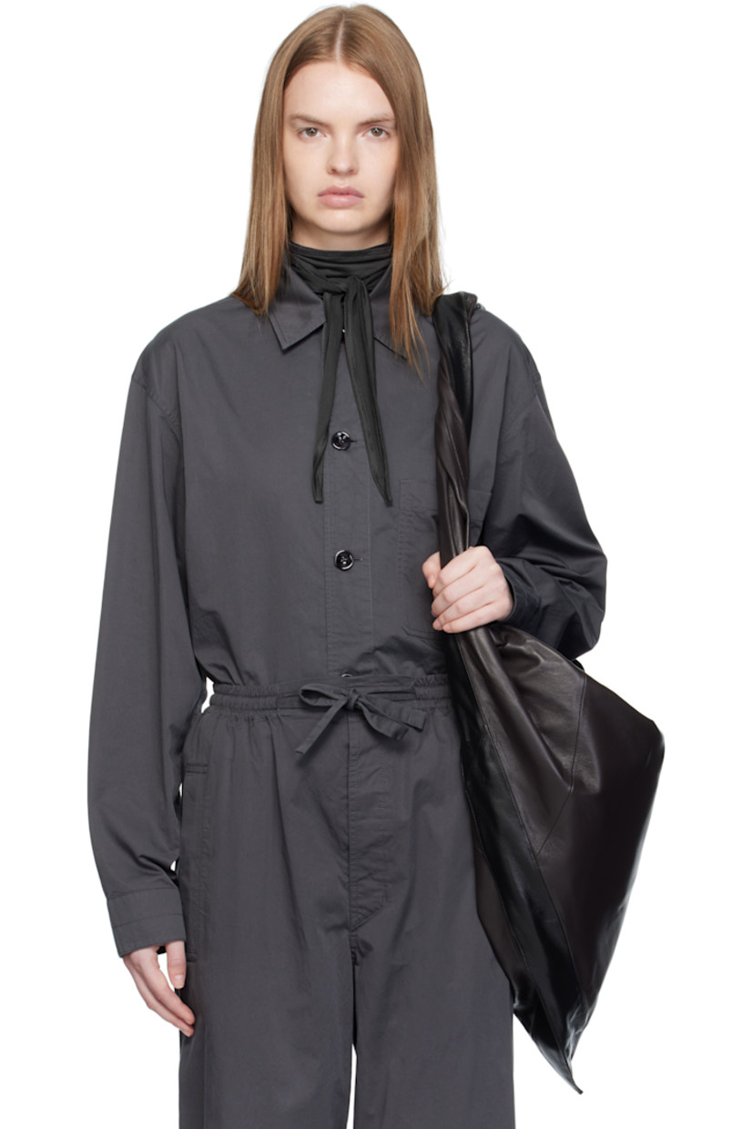 Lightweight cotton sateen shirt.

· Spread collar
· Button closure
· Patch pocket at chest
· Vented side seams
· Dropped shoulders
· Buttoned barrel cuffs

Supplier color: Carbon grey