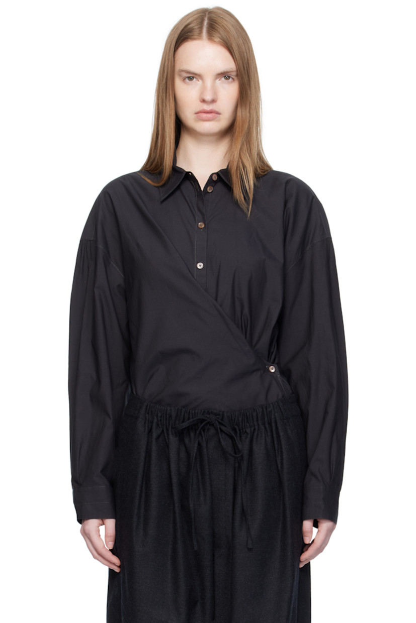 Washed cotton- and silk-blend poplin shirt.

· Spread collar
· Asymmetrical button and self-tie closure
· Dropped shoulders
· Buttoned barrel cuffs
· Gathering at back yoke

Supplier color: Squid ink